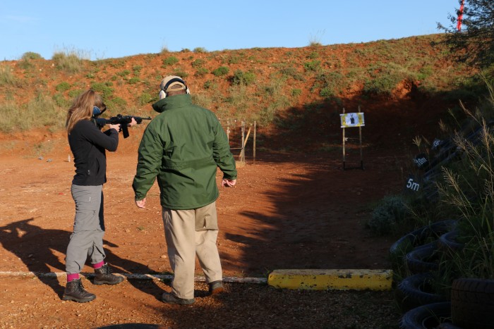A volunteer works on her darting skills at the Shamwari Conservation Experience