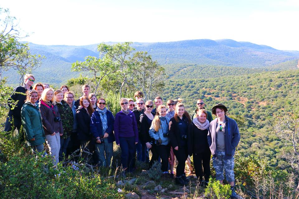 SGS volunteers pose at the top of a hill at the Shamwari conservation experience