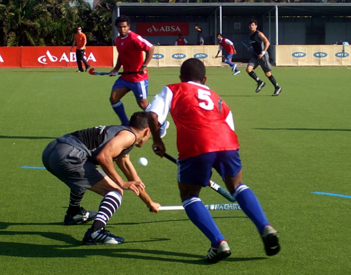 Young men playing hockey