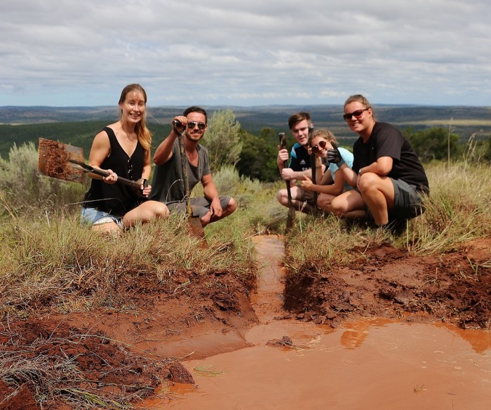 Volunteers working on the drainage at the Shamwari Conservation Experience